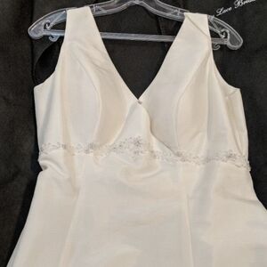 Ivory Sleeveless Wedding Gown with Embellished Waist